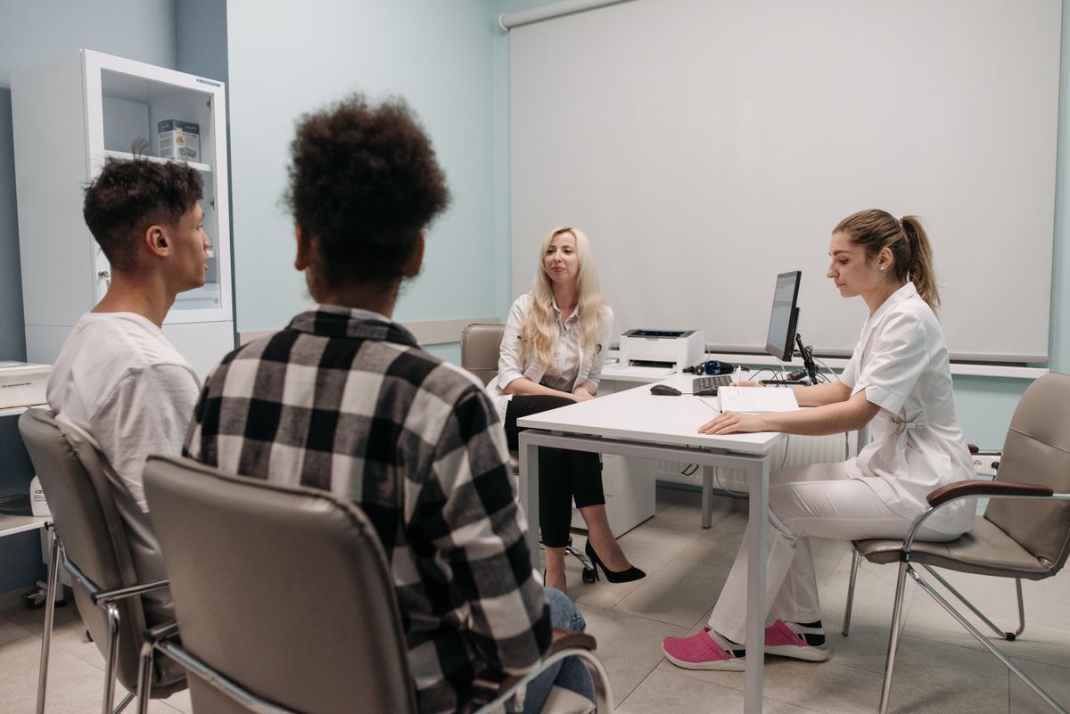 Patients discussing a care plan at a clinic